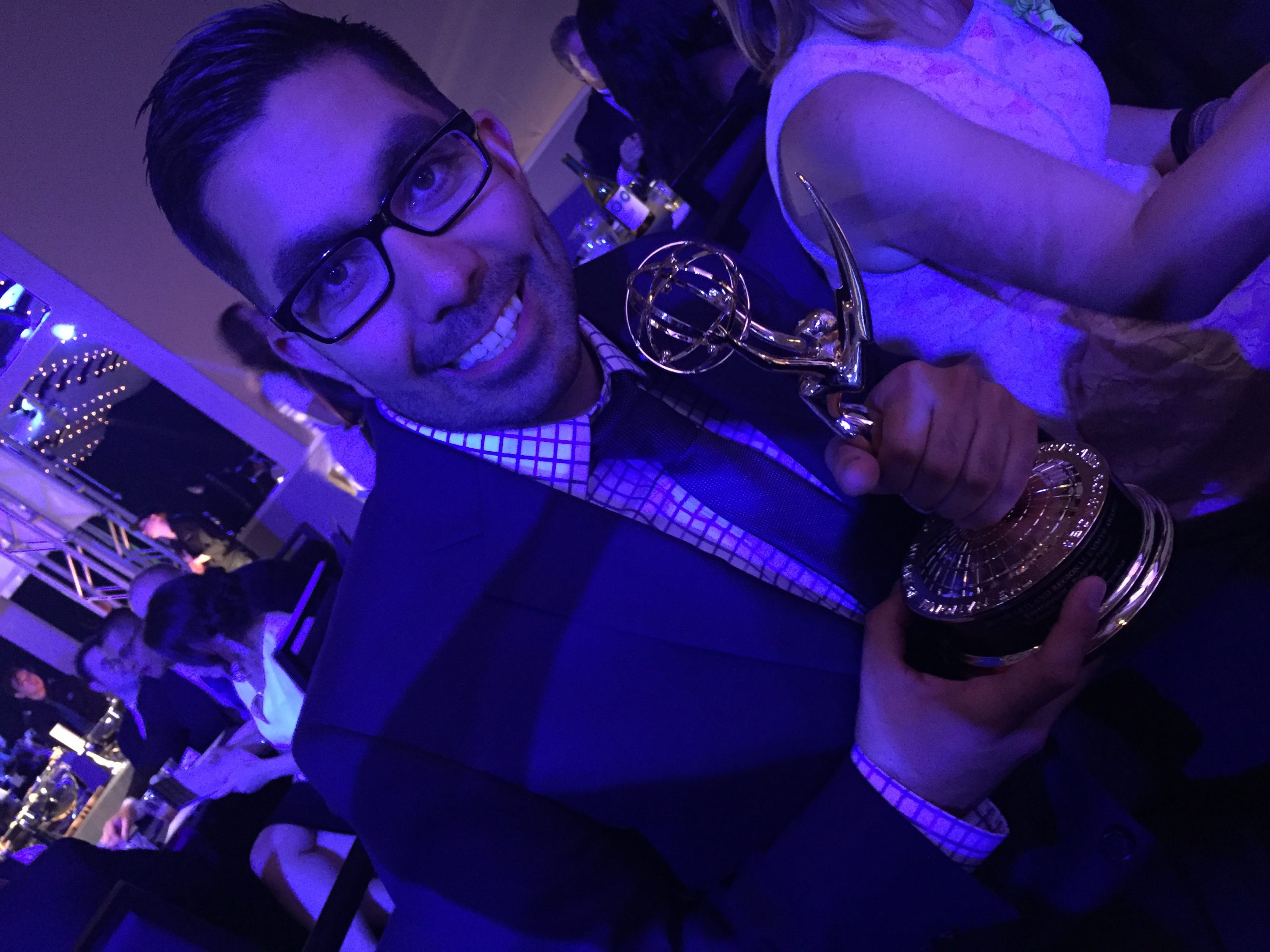 Rico with an Emmy